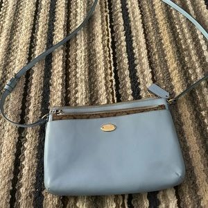 Cute Crossbody Coach purse.